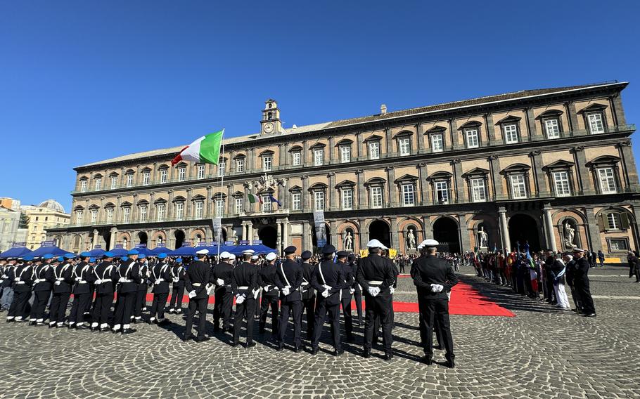 Military member line up for a formal ceremony in the Piazza on a sunny day in Naples 